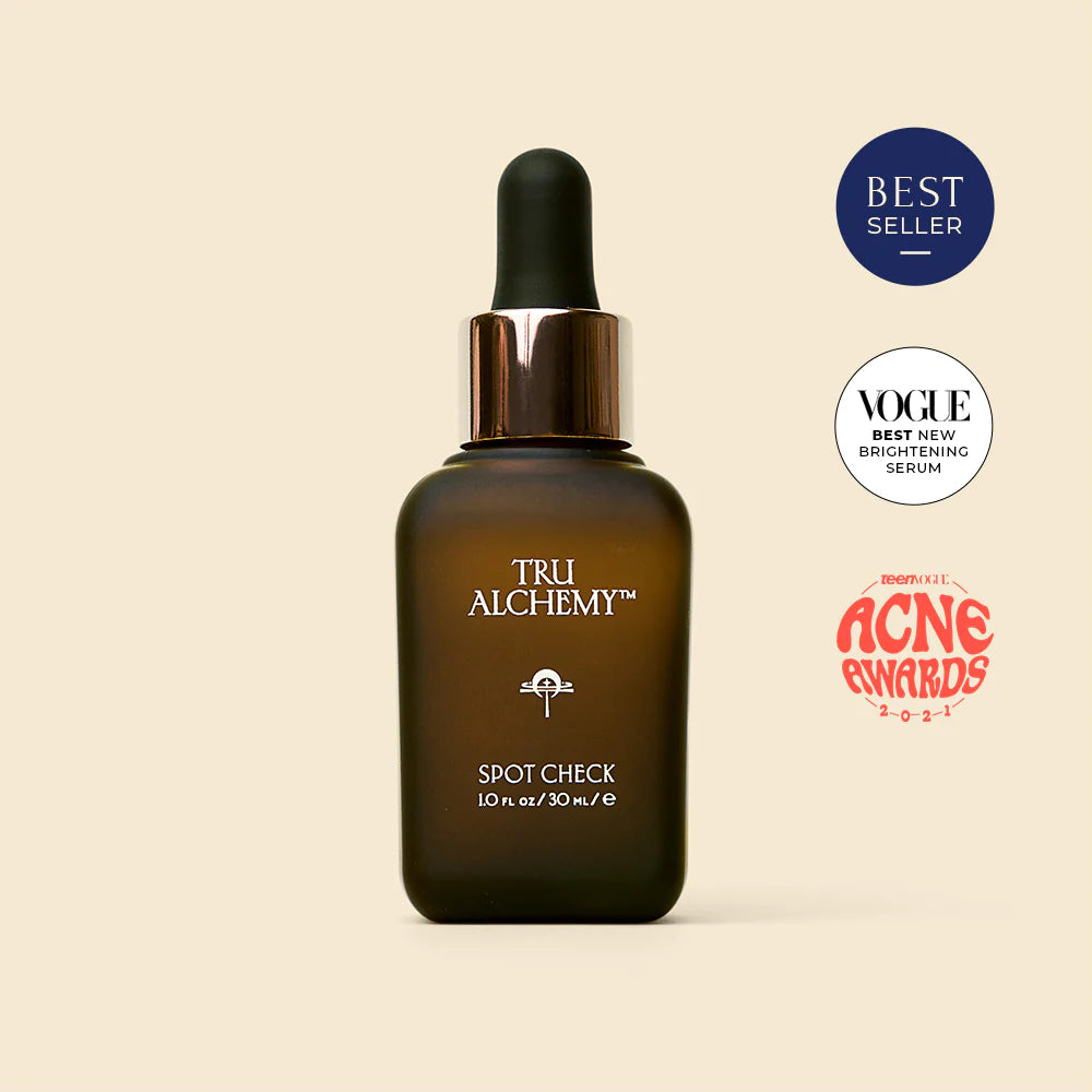Tru Alchemy Spot Check bottle with awards seals