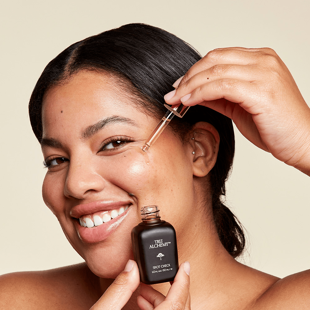 woman using Tru Alchemy&