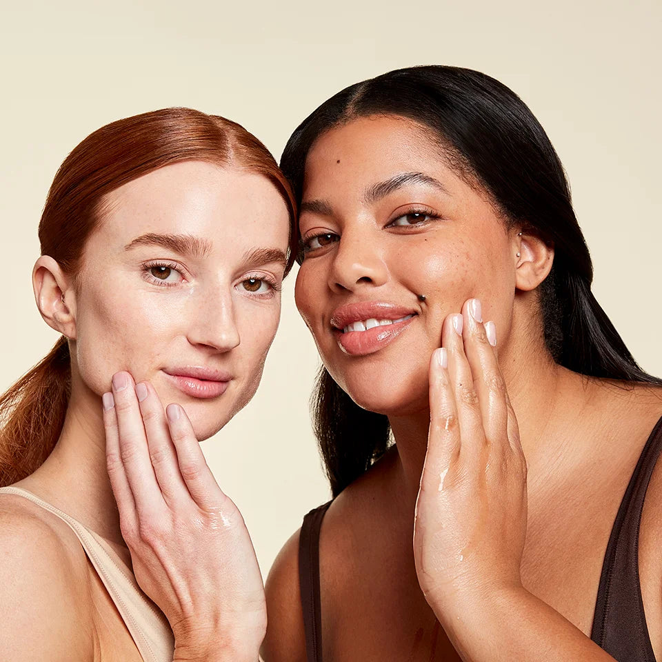 two women using Tru Alchemy's All-Day Brightening Duo