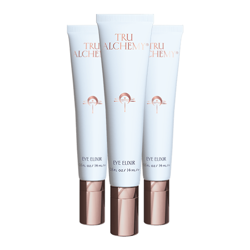 TruAlchemy Eye Elixir three-tube set with rose gold applicator caps in light blue packaging