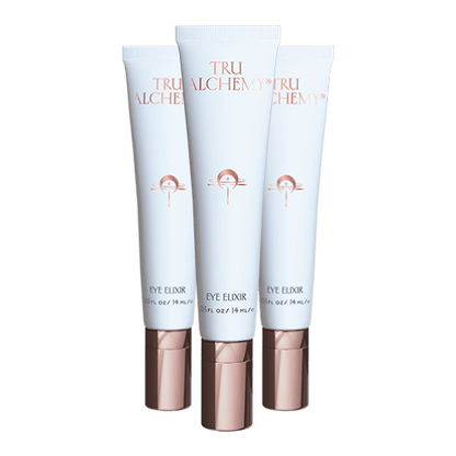 TruAlchemy Eye Elixir three-tube set with rose gold applicator caps in light blue packaging