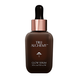 TruAlchemy Glow Serum in dark glass bottle with rose gold dropper, 30ml