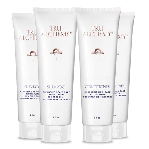 TruAlchemy Shampoo &amp; Conditioner Set with four white bottles containing cleansing shampoo and hydrating conditioner with tea