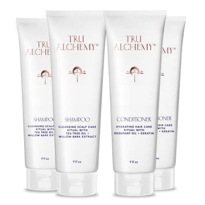 TruAlchemy Shampoo &amp; Conditioner Set with four white bottles containing cleansing shampoo and hydrating conditioner with tea