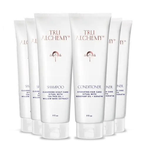 TruAlchemy Shampoo &amp; Conditioner Set with six white tubes arranged in a circle, featuring cleansing scalp care shampoo and